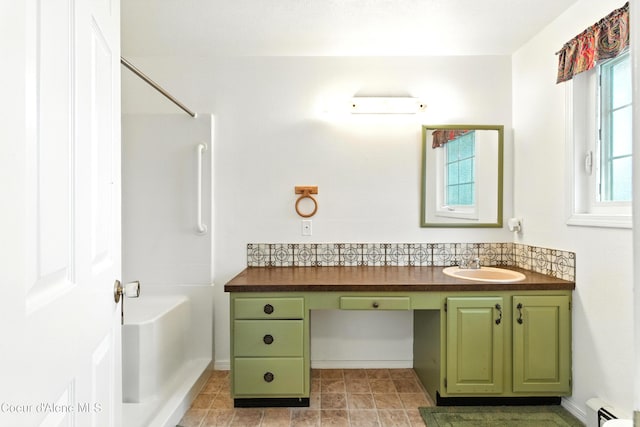 5678 N Pinegrove Dr, Coeur Dalene, ID 83815 - bathroom featuring vanity, shower / bath combination, and a baseboard radiator