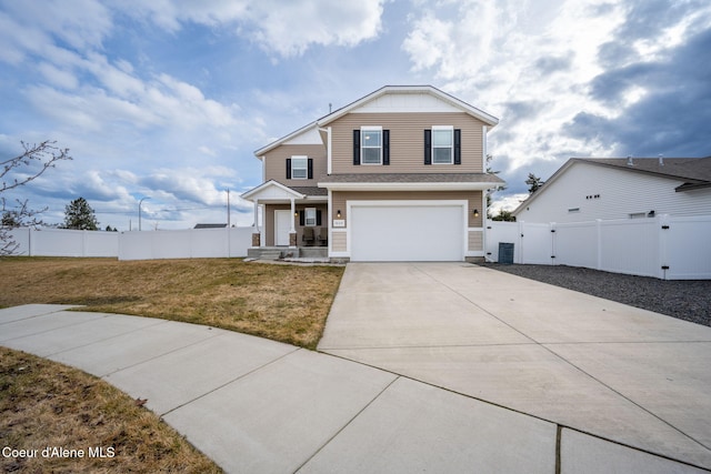 3664 W Belgrave Way, Hayden, ID 83835 - traditional home featuring concrete driveway, a garage, and a porch