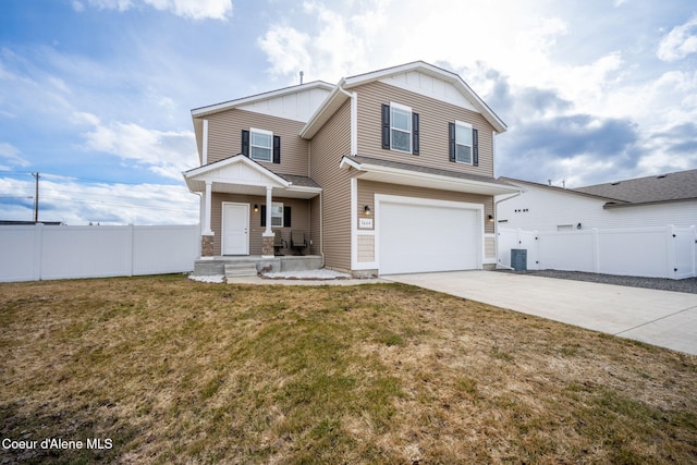 3664 W Belgrave Way, Hayden, ID 83835 - view of front facade with board and batten siding, concrete driveway, and an attached garage