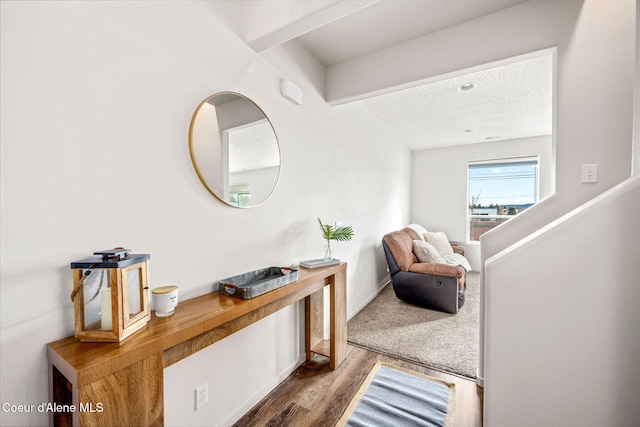 3664 W Belgrave Way, Hayden, ID 83835 - hall featuring wood finished floors and beam ceiling