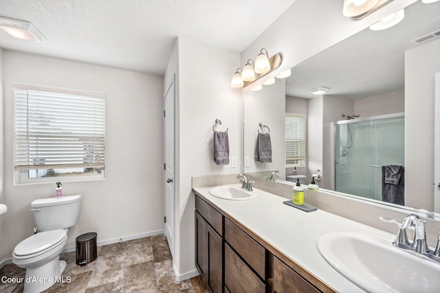 3664 W Belgrave Way, Hayden, ID 83835 - bathroom with double vanity and a stall shower