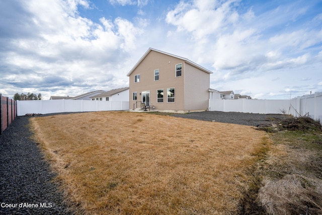 3664 W Belgrave Way, Hayden, ID 83835 - back of house featuring a fenced backyard