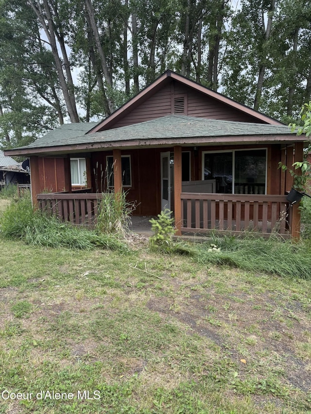 103 2nd St, Tensed, ID 83870 - view of front of house with a porch and roof with shingles