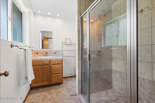 174 Where Its At Rd, Athol, ID 83801 - bathroom featuring vanity, a shower stall, recessed lighting, and backsplash