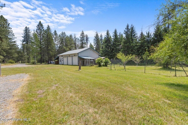 174 Where Its At Rd, Athol, ID 83801 - view of yard with an outdoor structure and a garage