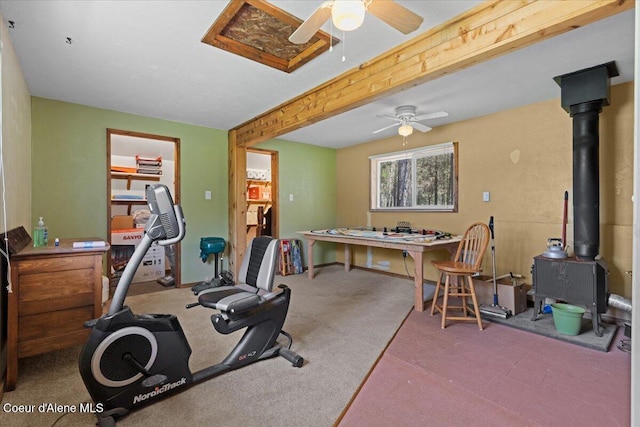 174 Where Its At Rd, Athol, ID 83801 - workout room featuring ceiling fan and a wood stove