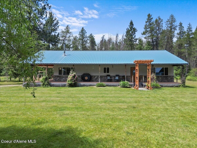 174 Where Its At Rd, Athol, ID 83801 - back of property with a lawn and a metal roof