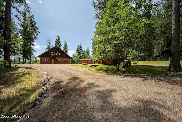 1911 Carr Creek Rd, Sandpoint, ID 83864 - view of front of property featuring driveway and an outbuilding