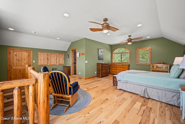 1911 Carr Creek Rd, Sandpoint, ID 83864 - bedroom featuring lofted ceiling, light wood-type flooring, and recessed lighting