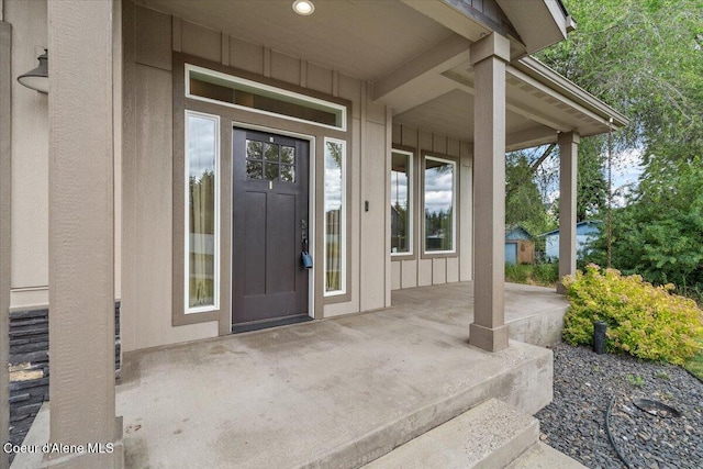 1877 W Orchard Ave, Hayden, ID 83835 - view of exterior entry with board and batten siding