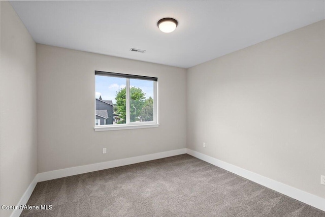 1877 W Orchard Ave, Hayden, ID 83835 - spare room featuring carpet