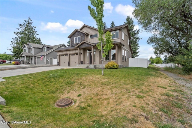 1877 W Orchard Ave, Hayden, ID 83835 - view of front of home with driveway and board and batten siding