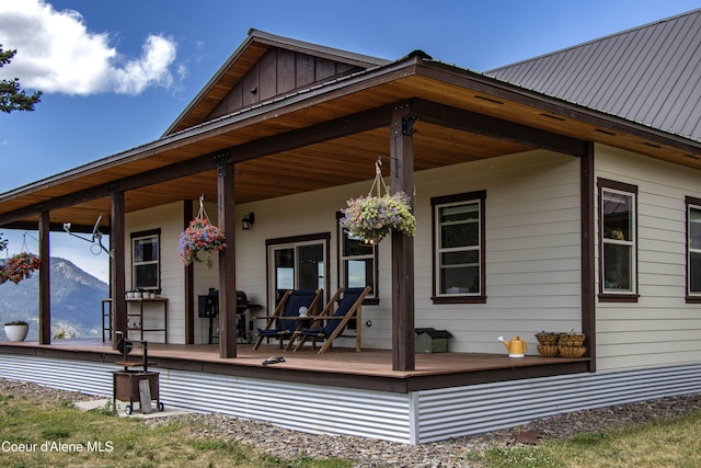 1010 Mc Quade Gulch Dr, Clark Fork, ID 83811 - back of house with a porch and board and batten siding