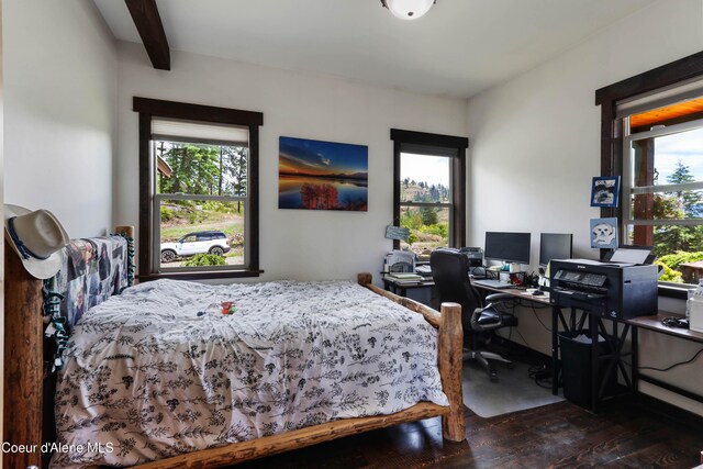 1010 Mc Quade Gulch Dr, Clark Fork, ID 83811 - bedroom with wood finished floors, multiple windows, and a desk