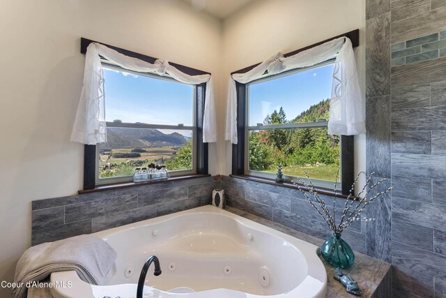 1010 Mc Quade Gulch Dr, Clark Fork, ID 83811 - bathroom with a whirlpool tub