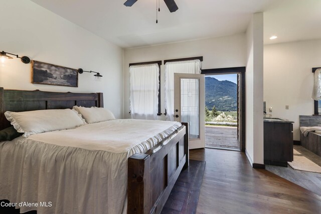1010 Mc Quade Gulch Dr, Clark Fork, ID 83811 - bedroom with access to outside, dark wood-style flooring, multiple windows, recessed lighting, and a ceiling fan