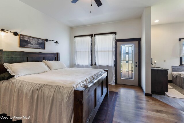 1010 Mc Quade Gulch Dr, Clark Fork, ID 83811 - bedroom featuring dark wood-type flooring, a ceiling fan, recessed lighting, and access to exterior