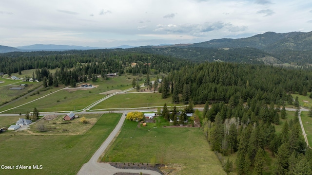 5570 E Dodd Rd, Hayden, ID 83835 - aerial view of property's location featuring a mountain backdrop and rural landscape