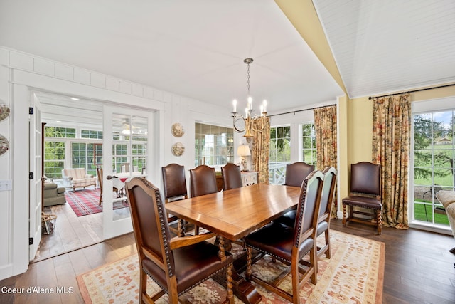 5570 E Dodd Rd, Hayden, ID 83835 - dining space featuring wood-type flooring and a chandelier