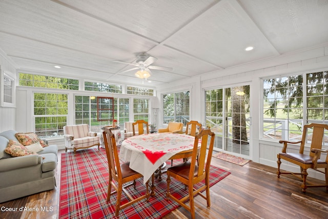 5570 E Dodd Rd, Hayden, ID 83835 - sunroom / solarium with healthy amount of natural light, wood finished floors, and a decorative wall