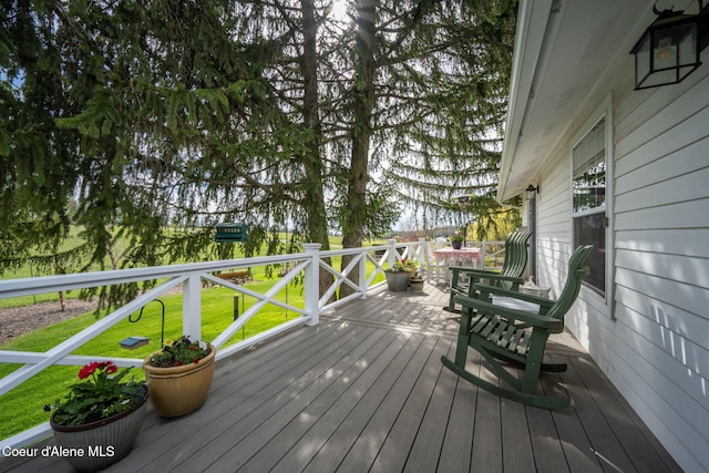 5570 E Dodd Rd, Hayden, ID 83835 - deck with a lawn