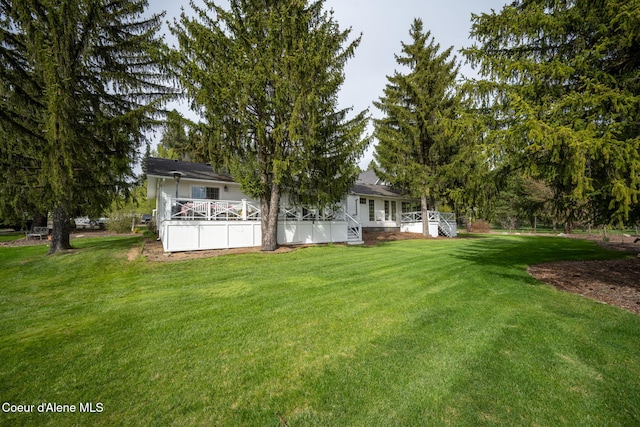 5570 E Dodd Rd, Hayden, ID 83835 - view of grassy yard with a porch