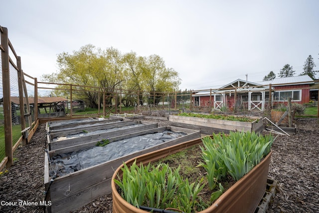 5570 E Dodd Rd, Hayden, ID 83835 - view of yard with a vegetable garden