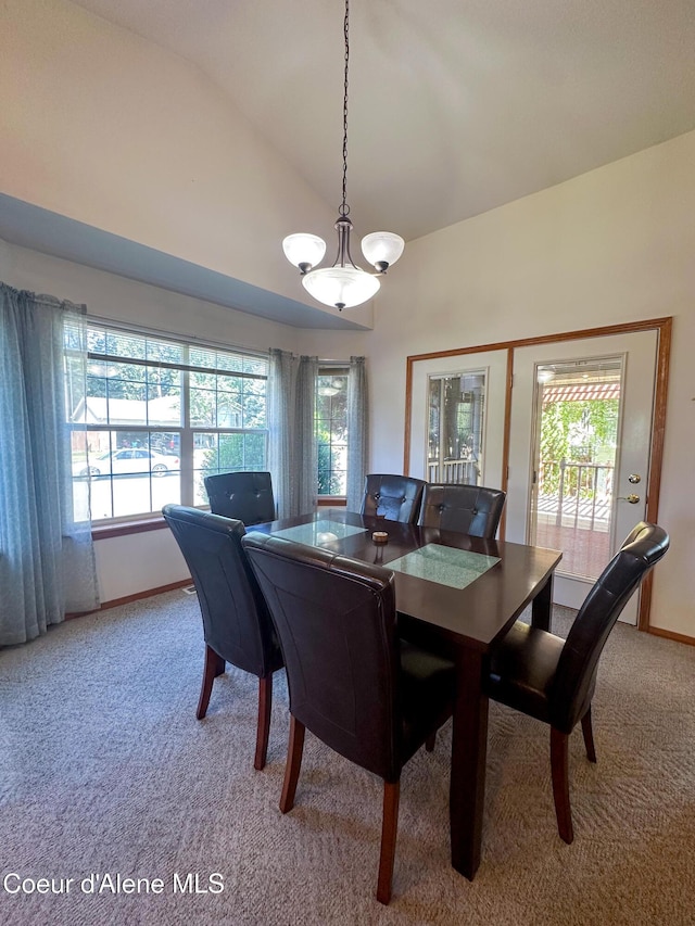 1276 W Edgewood Cir, Coeur Dalene, ID 83815 - dining area featuring light carpet, healthy amount of natural light, and high vaulted ceiling