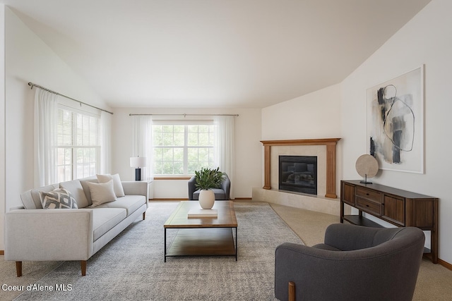 1276 W Edgewood Cir, Coeur Dalene, ID 83815 - carpeted living area featuring lofted ceiling and a glass covered fireplace
