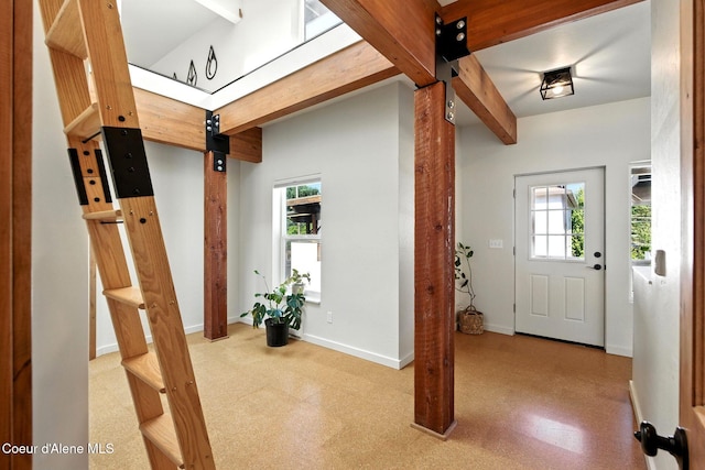 1106 Larch St Unit A, Sandpoint, ID 83864 - foyer entrance with a barn door and beam ceiling