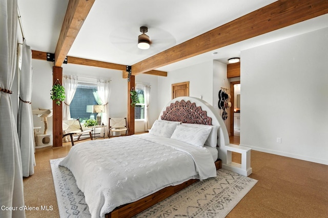 1106 Larch St Unit A, Sandpoint, ID 83864 - carpeted bedroom with beamed ceiling and baseboards
