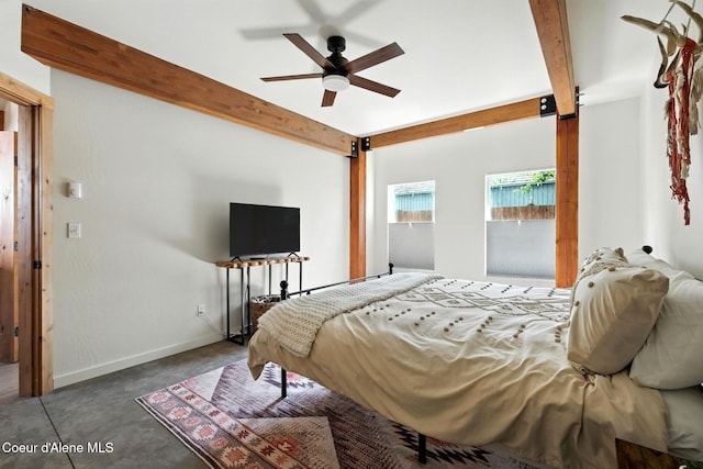 1106 Larch St Unit A, Sandpoint, ID 83864 - bedroom with finished concrete floors, beamed ceiling, and a ceiling fan