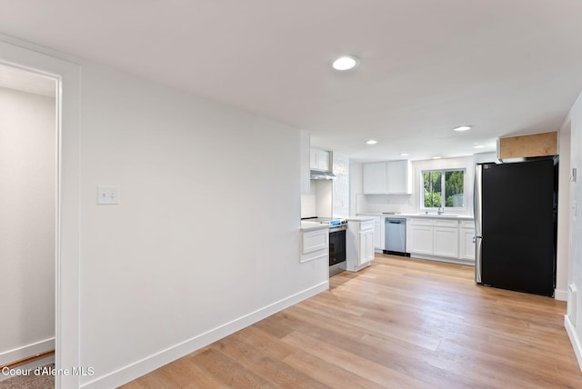 15116 E 4th Ave, Veradale, WA 99037 - kitchen with stainless steel appliances, white cabinets, light wood-type flooring, light countertops, and recessed lighting