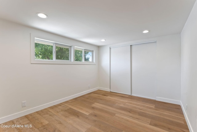 15116 E 4th Ave, Veradale, WA 99037 - unfurnished bedroom with light wood finished floors, a closet, and recessed lighting