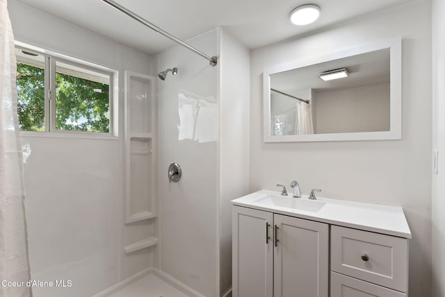 15116 E 4th Ave, Veradale, WA 99037 - bathroom featuring a shower with shower curtain and vanity