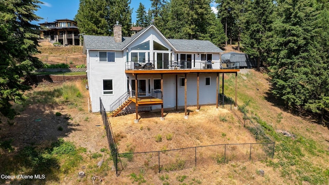 1273 S Grouse Meadow Dr, Coeur Dalene, ID 83814 - back of house featuring a deck, a chimney, and stairway