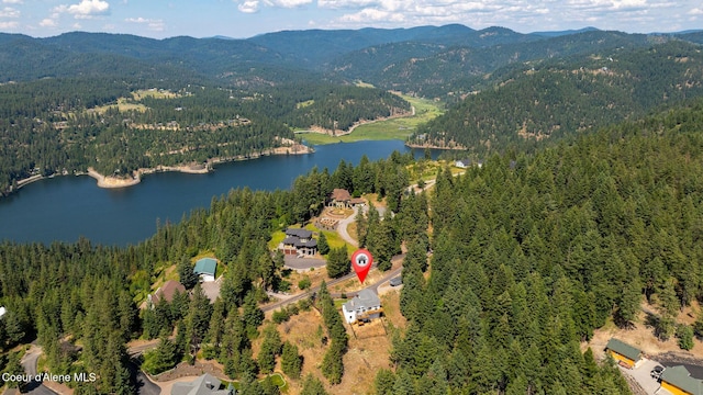 1273 S Grouse Meadow Dr, Coeur Dalene, ID 83814 - aerial view of property and surrounding area with a heavily wooded area and a water and mountain view