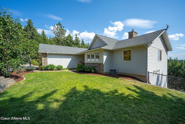 1273 S Grouse Meadow Dr, Coeur Dalene, ID 83814 - view of front of house featuring a chimney, roof with shingles, and stone siding