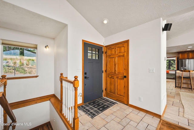1273 S Grouse Meadow Dr, Coeur Dalene, ID 83814 - entrance foyer with vaulted ceiling, healthy amount of natural light, and recessed lighting
