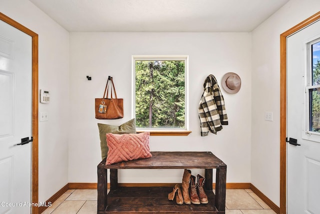 1273 S Grouse Meadow Dr, Coeur Dalene, ID 83814 - foyer featuring light tile patterned flooring and baseboards