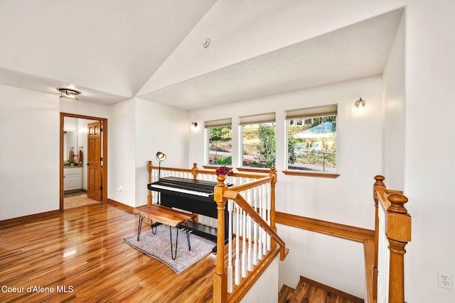 1273 S Grouse Meadow Dr, Coeur Dalene, ID 83814 - dining area with lofted ceiling and wood finished floors