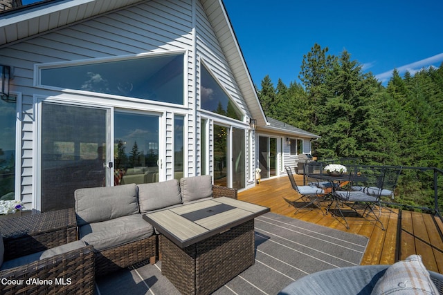 1273 S Grouse Meadow Dr, Coeur Dalene, ID 83814 - wooden deck with outdoor dining area and outdoor lounge area