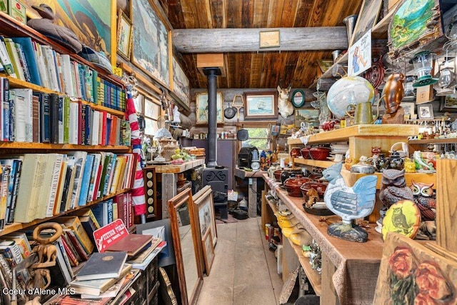 72 Hank Allen Way, Blanchard, ID 83804 - miscellaneous room featuring wood ceiling, concrete flooring, and a wood stove