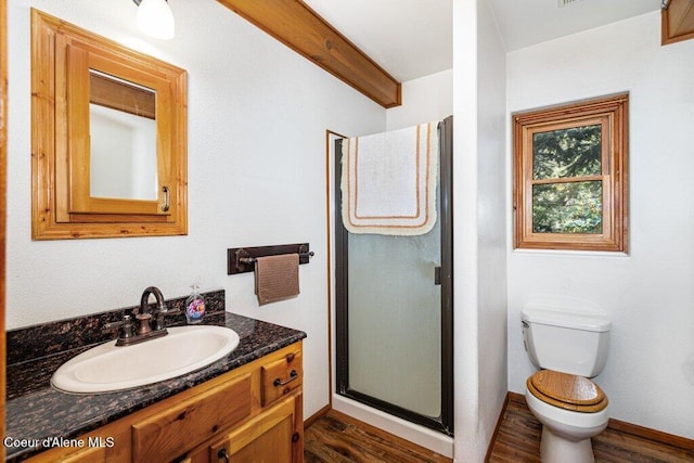 72 Hank Allen Way, Blanchard, ID 83804 - bathroom with vanity, a shower stall, and wood finished floors