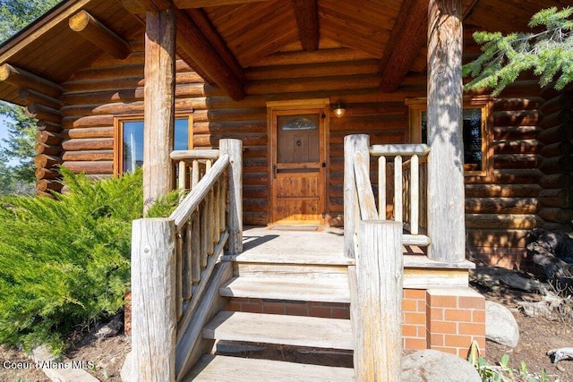 72 Hank Allen Way, Blanchard, ID 83804 - doorway to property with log exterior