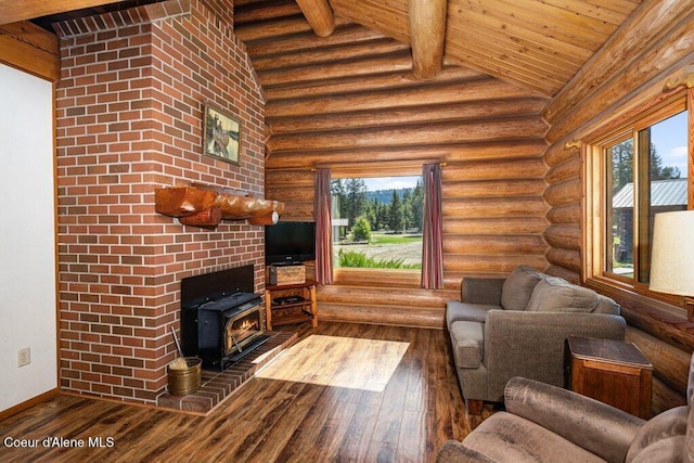 72 Hank Allen Way, Blanchard, ID 83804 - living area with a wood stove, dark wood-style floors, wood ceiling, and log walls