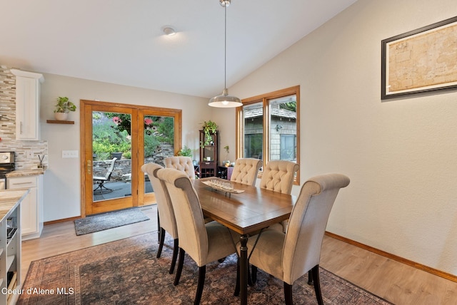 3011 E Fernan Ct, Coeur Dalene, ID 83814 - dining room featuring light wood finished floors and vaulted ceiling