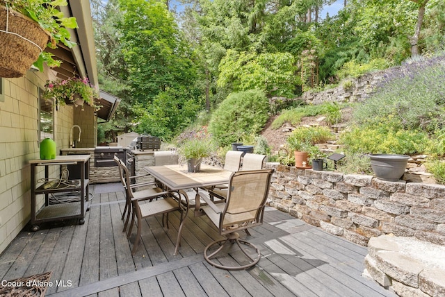 3011 E Fernan Ct, Coeur Dalene, ID 83814 - wooden deck featuring outdoor dining space