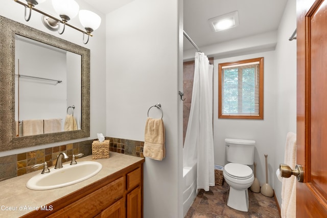 515 S Idaho St, Post Falls, ID 83854 - bathroom featuring vanity, backsplash, shower / bath combination with curtain, and stone finish flooring