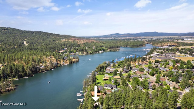 515 S Idaho St, Post Falls, ID 83854 - aerial view of property and surrounding area with a forest and a water and mountain view